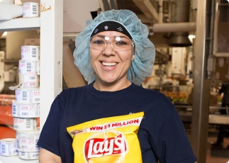 A woman worker smiling at camera